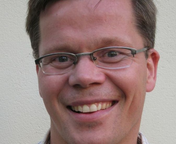 Portrett av en mann med briller