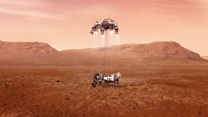 Et romkjøretøy senkes ned på planeten Mars